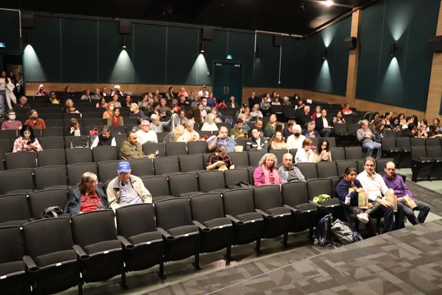 Attendees gathered in the venue foyer before a screening
