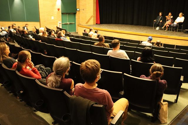 A large seated audience filling the Cinecenta auditorium